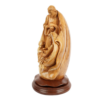 Holy Family with Child in arms – Hand-carved olive wood sculpture from Bethlehem (32 cm)