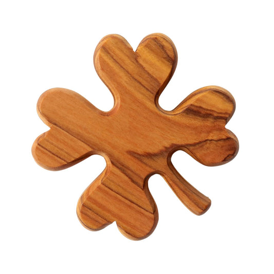 Cloverleaf as a lucky charm made of olive wood
